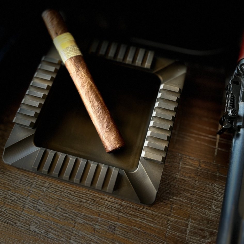 Ungovernable Collection Founder Edition Quad Rail cigar tray in a distressed burnt bronze, highly durable cerakote finish, hand crafted, designed, and made in the USA, precision milled from aluminum. 
