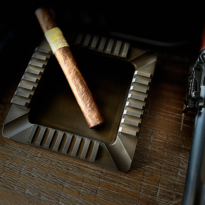 Ungovernable Collection Founder Edition Quad Rail cigar tray in a distressed burnt bronze, highly durable cerakote finish, hand crafted, designed, and made in the USA, precision milled from aluminum. 
