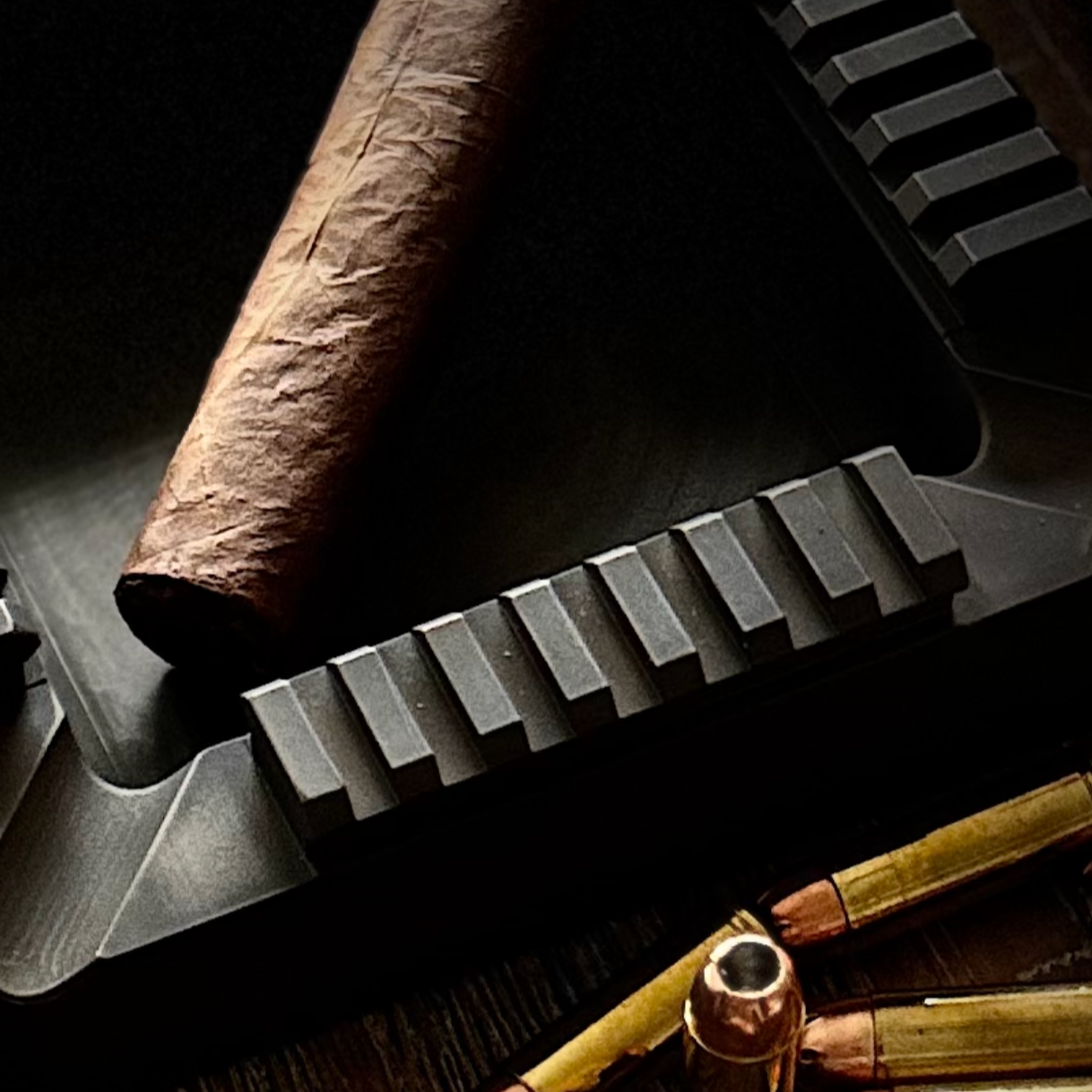 Ungovernable Collection Founder Edition Quad Rail cigar tray in a distressed burnt bronze, highly durable cerakote finish, hand crafted, designed, and made in the USA, precision milled from aluminum. 
